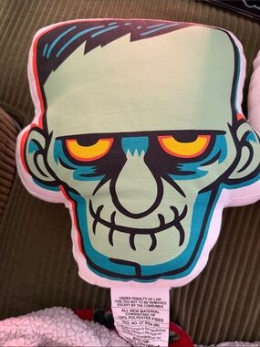 Graphic Frankenstein Face Throw Pillow and mummy